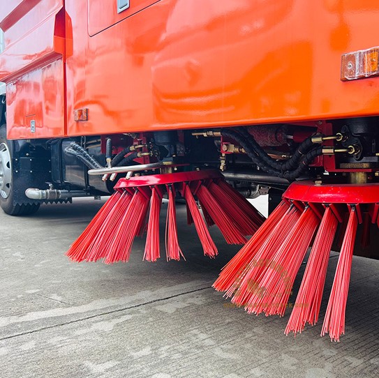 Sweeper Brush System With Water Spraying System.